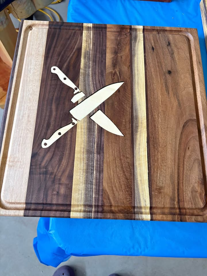Chef knife cutting board with striped hardwoods