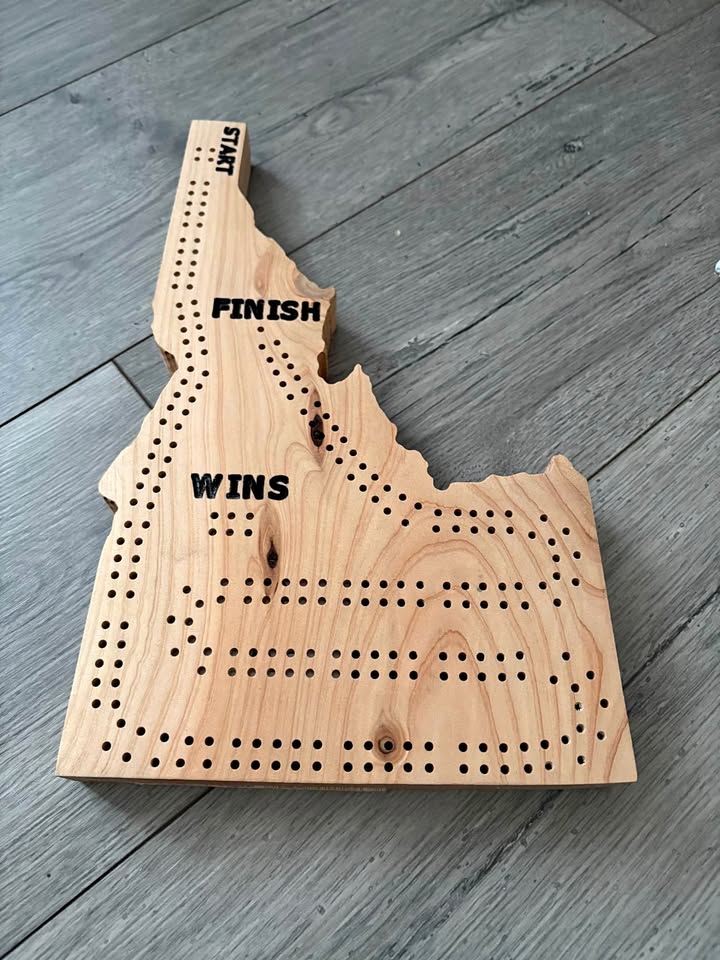 Idaho state-shaped cribbage board